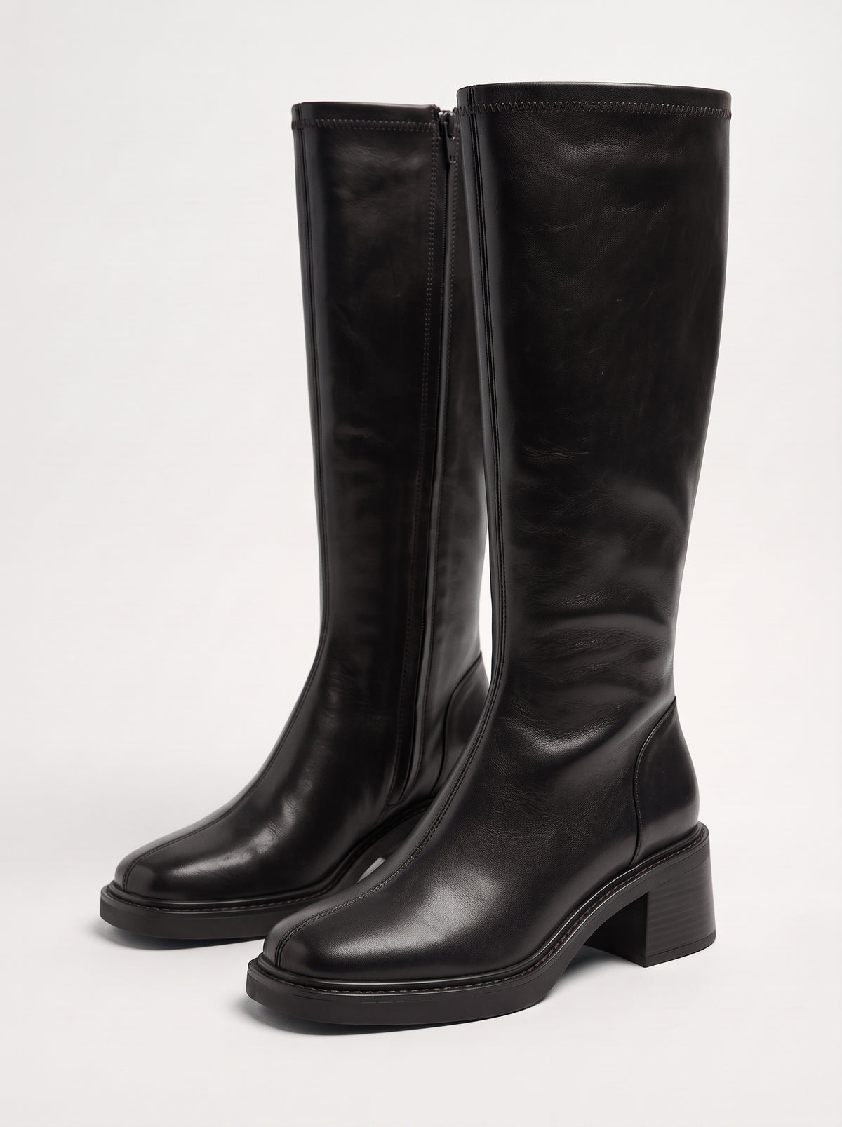 Marina | Botas altas de cuero de punta fina y tacón bajo